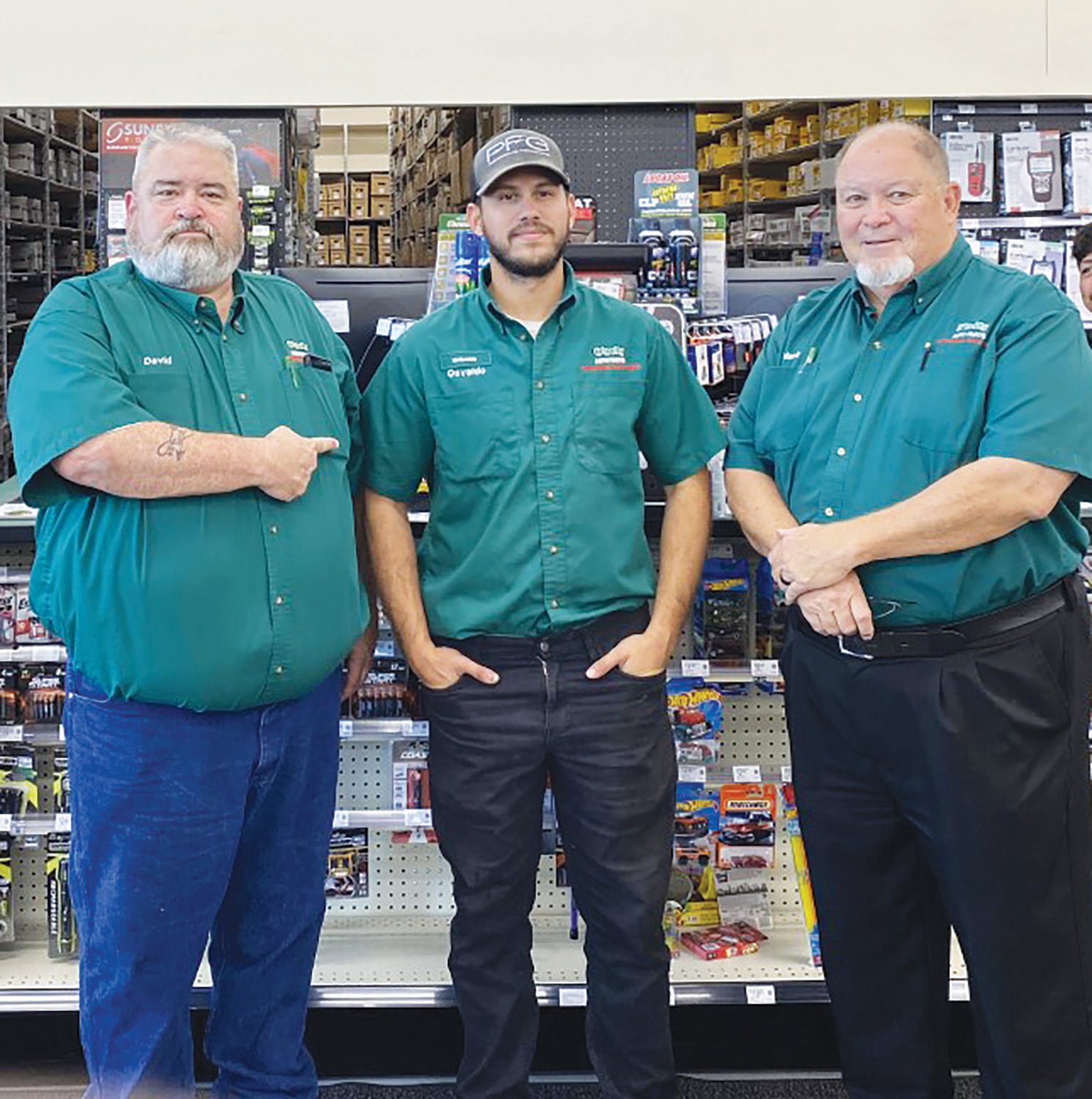 L-R: Assistant Manager David Hicks, Manager Osvaldo Perez and Assistant Manager Mark Duda at the new O'Reillly Auto Parts store in LaBelle.